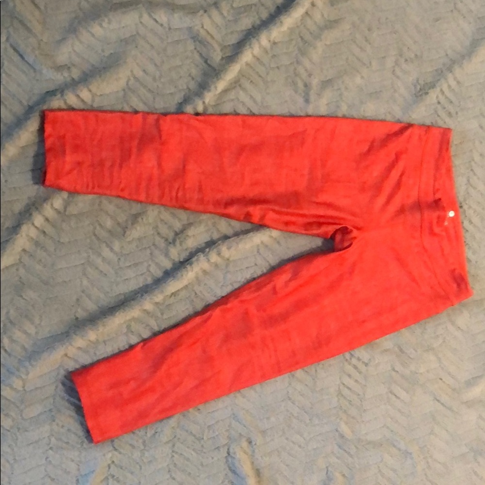 Bright orange work out capris